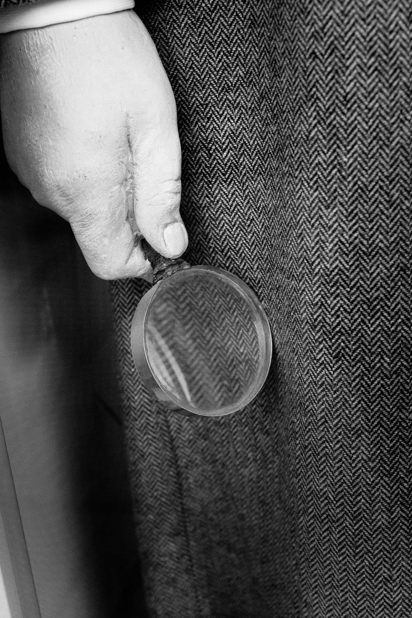 A pick glass held over herringbone cloth
