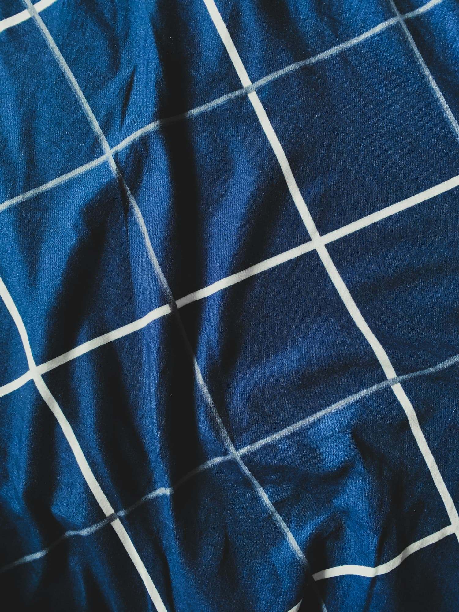 Navy fabric with a white windowpane check