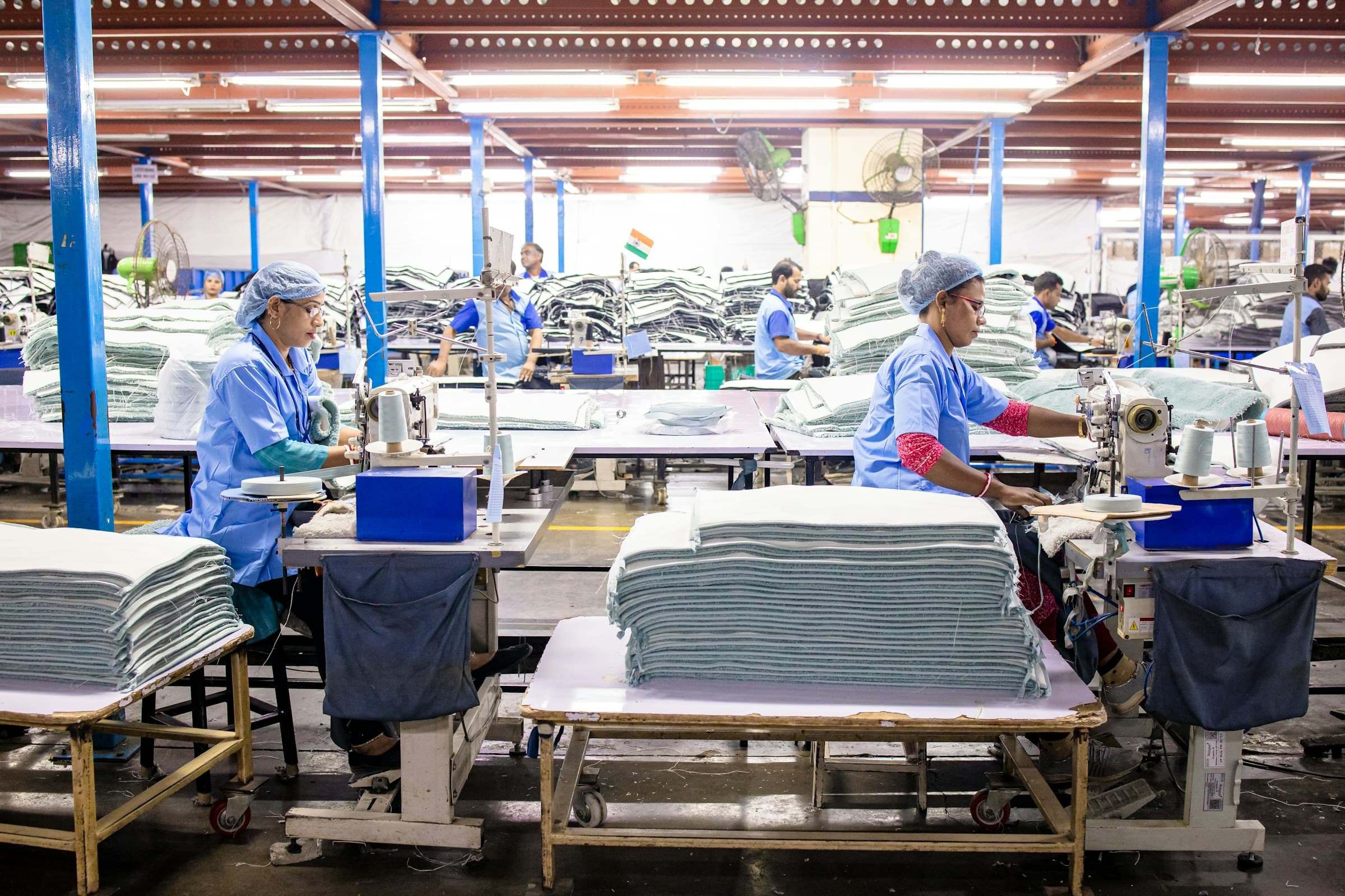 Machinists at work on a garment factory floor