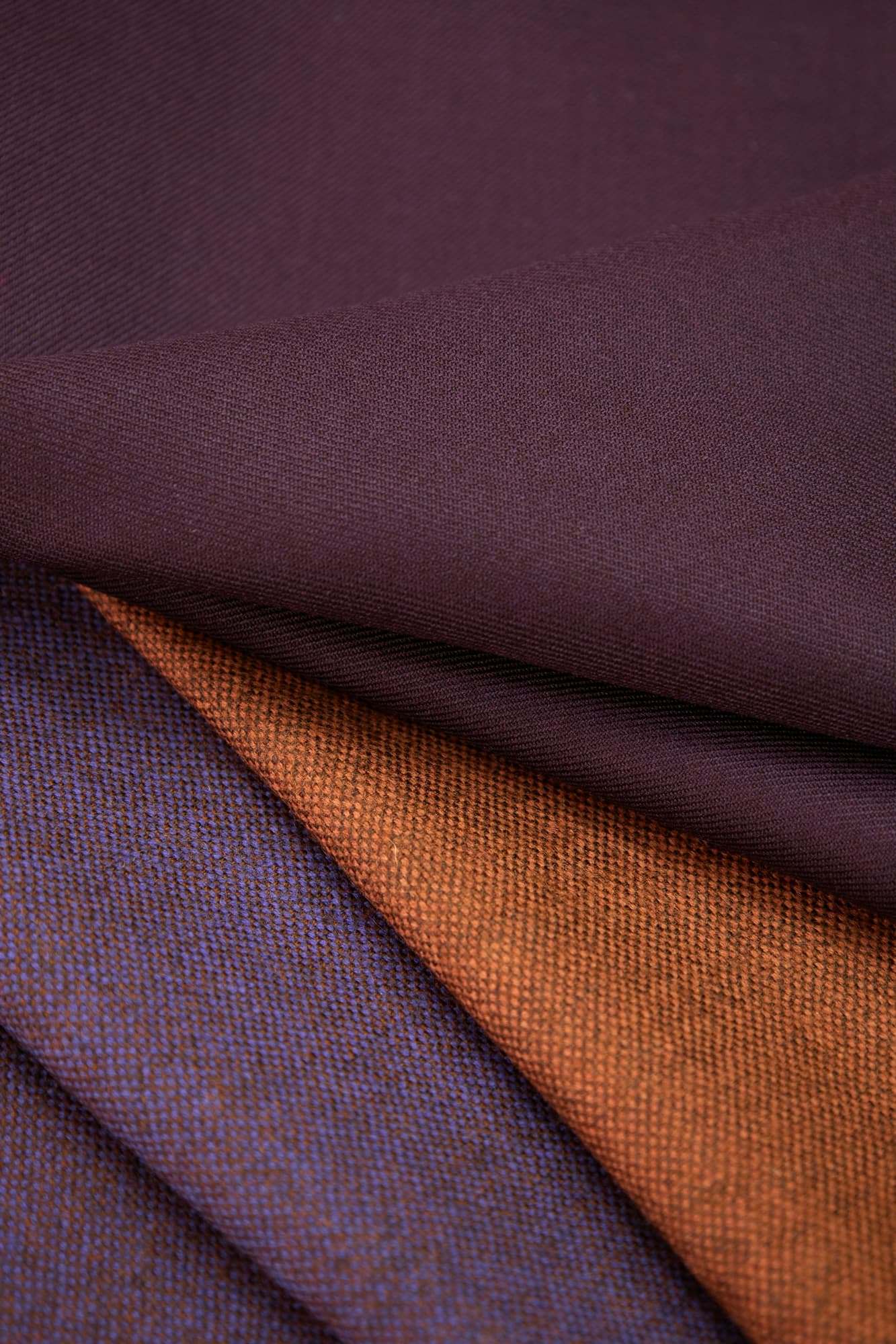 Plum and rust twill fabric overlapping